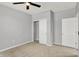 Bedroom with ceiling fan, carpet, and double door closet at 3538 Heathcliff Ct, Westfield, IN 46074