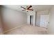 This bedroom offers carpet and a fan at 3538 Heathcliff Ct, Westfield, IN 46074