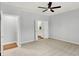 Spacious bedroom with ceiling fan, plush carpeting, and en-suite bath at 3538 Heathcliff Ct, Westfield, IN 46074
