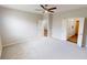 Large bedroom with neutral carpet and a ceiling fan at 3538 Heathcliff Ct, Westfield, IN 46074