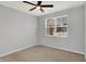 Bedroom with ceiling fan, carpet, and large window at 3538 Heathcliff Ct, Westfield, IN 46074