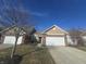 Tan and brick ranch home with attached garage at 3538 Heathcliff Ct, Westfield, IN 46074