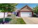 Charming single-Gathering home with well-manicured lawn and a two car garage at 3538 Heathcliff Ct, Westfield, IN 46074
