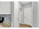 Clean hallway with neutral-toned walls and wood-look flooring at 3538 Heathcliff Ct, Westfield, IN 46074