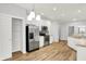 Modern kitchen with stainless steel appliances and white cabinets at 3538 Heathcliff Ct, Westfield, IN 46074