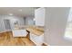 Kitchen with stainless steel appliances, white cabinets, and a view to other rooms at 3538 Heathcliff Ct, Westfield, IN 46074