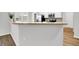 Kitchen breakfast bar with light countertops and white cabinets at 3538 Heathcliff Ct, Westfield, IN 46074