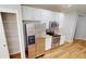 Modern kitchen with stainless steel appliances, white cabinetry, and ample counter space at 3538 Heathcliff Ct, Westfield, IN 46074
