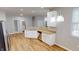 Kitchen with stainless steel appliances, white cabinets, and a view to other rooms at 3538 Heathcliff Ct, Westfield, IN 46074