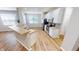 Bright kitchen features white cabinets, modern stainless appliances, and a functional island at 3538 Heathcliff Ct, Westfield, IN 46074