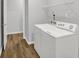 Convenient laundry room with washer, dryer, and shelving at 3538 Heathcliff Ct, Westfield, IN 46074