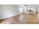 Bright living room features sleek hardwood floors and a large window at 3538 Heathcliff Ct, Westfield, IN 46074