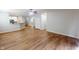 Open-concept living area with hardwood floors and views into the modern kitchen space at 3538 Heathcliff Ct, Westfield, IN 46074