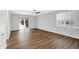 Living room with wood floors, sliding glass door, and neutral wall colors at 3538 Heathcliff Ct, Westfield, IN 46074