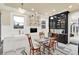 Bright kitchen features white cabinets, farmhouse sink, and built in butlers pantry at 4621 N Meridian St, Indianapolis, IN 46208