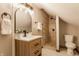 Modern bathroom with a large walk-in shower and updated vanity at 5009 E Michigan E St, Indianapolis, IN 46201