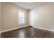 Spacious bedroom with hardwood floors and a closet at 5009 E Michigan E St, Indianapolis, IN 46201