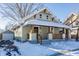 Renovated craftsman home with a covered porch and detached garage at 5009 E Michigan E St, Indianapolis, IN 46201