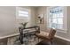 Bright home office features a desk, chair, and large window at 5009 E Michigan E St, Indianapolis, IN 46201