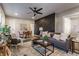 Open concept living room with gray sofa and geometric wall at 5009 E Michigan E St, Indianapolis, IN 46201