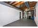Unfinished basement area showing ductwork and painted concrete walls and floors at 7027 Creekside Ln, Indianapolis, IN 46220