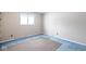 Corner bedroom with carpet square and a window for natural light at 7027 Creekside Ln, Indianapolis, IN 46220