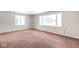 Bright and airy living room with large windows offering natural light and great view at 7027 Creekside Ln, Indianapolis, IN 46220