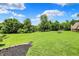 This spacious backyard is the perfect place to add a trampoline and enjoy the day at 3592 W Smokey Row Rd, Bargersville, IN 46106