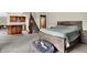 Open basement with a kitchenette, staircase and comfortable bedroom area at 3592 W Smokey Row Rd, Bargersville, IN 46106