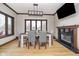Dining room with hardwood floors, a fireplace, and a view of the outdoor scenery at 3592 W Smokey Row Rd, Bargersville, IN 46106