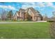 Beautiful two-story brick home with a three-car garage and expansive green lawn at 3592 W Smokey Row Rd, Bargersville, IN 46106