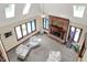 Overhead view of a sunlit living room with a fireplace, skylights, and comfortable seating arrangement at 3592 W Smokey Row Rd, Bargersville, IN 46106