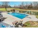 Sparkling pool with a slide and diving board, perfect for summer fun at 3592 W Smokey Row Rd, Bargersville, IN 46106