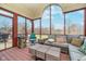 Relaxing sunroom with comfortable seating and backyard views through large windows at 3592 W Smokey Row Rd, Bargersville, IN 46106