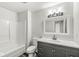 Bright bathroom with modern vanity, white tub, and updated fixtures at 5845 Shipwatch Pl, Indianapolis, IN 46237