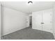 Bedroom boasts plush carpet, bright lighting, and a closet for storage at 5845 Shipwatch Pl, Indianapolis, IN 46237