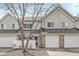 Charming townhouse featuring a one-car garage and well-maintained front yard at 5845 Shipwatch Pl, Indianapolis, IN 46237