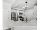 Modern kitchen with stainless steel appliances, quartz countertops, and eat-in bar at 5845 Shipwatch Pl, Indianapolis, IN 46237