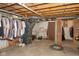Spacious unfinished basement with open ceilings and storage space, ready for personalized renovations at 7987 N Lasalle Rd, Morgantown, IN 46160