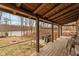 Inviting lakeside deck features wood floors, open views, and outdoor cooking area at 7987 N Lasalle Rd, Morgantown, IN 46160