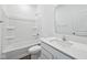 Bathroom featuring a shower/tub combination, white walls, and a white vanity at 113 Luna Pl, Shelbyville, IN 46176