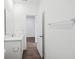 Bathroom featuring a white vanity and a doorway to another room at 113 Luna Pl, Shelbyville, IN 46176