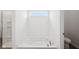 Bright bathroom featuring a bathtub with a window at 113 Luna Pl, Shelbyville, IN 46176