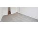 A carpeted bedroom with a doorway to another room in a bright home at 113 Luna Pl, Shelbyville, IN 46176