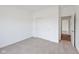 Bedroom featuring carpet, white walls, a closet, and a doorway at 113 Luna Pl, Shelbyville, IN 46176
