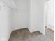 Walk-in closet with wire shelving and carpet flooring at 113 Luna Pl, Shelbyville, IN 46176