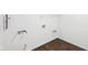 Utility room with water lines and wood-look flooring at 113 Luna Pl, Shelbyville, IN 46176