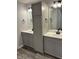 Well-appointed bathroom featuring dual vanities and modern fixtures, perfect for a luxurious and functional space at 1433 Wigwam Ln, Martinsville, IN 46151