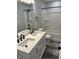 Modern full bathroom with double vanity, walk in shower, and black hardware at 1433 Wigwam Ln, Martinsville, IN 46151