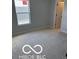 This bedroom offers neutral walls and natural light at 1433 Wigwam Ln, Martinsville, IN 46151